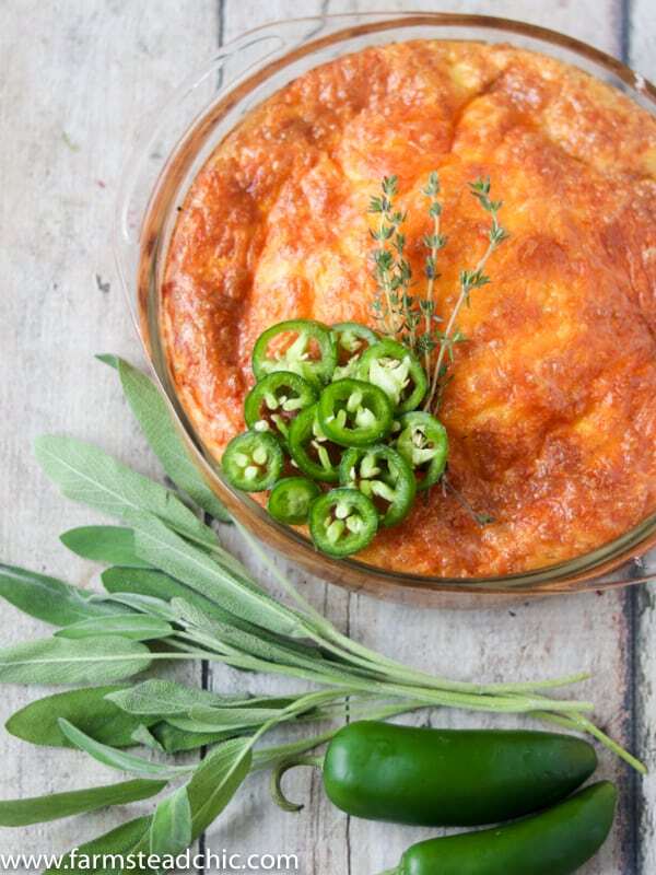 Keto Cheesy Sausage and Jalapeño Casserole with fresh sage and jalapeños, butter and shredded cheddar cheese.