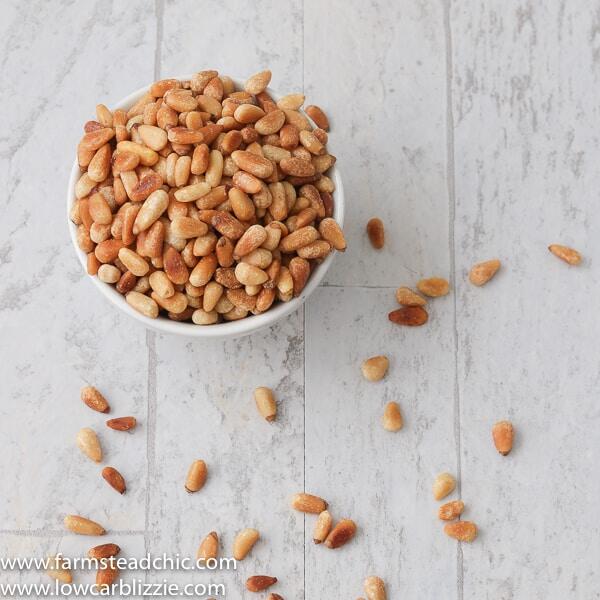 How to toast pine nuts! This super-quick, super-easy instructional post on how to toast pine nuts will bring your dreams of homemade keto pesto to life. All you need is a frying pan, a wooded spoon, and well, pine nuts!